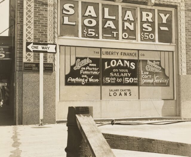 black and white photo of old savings and loan building