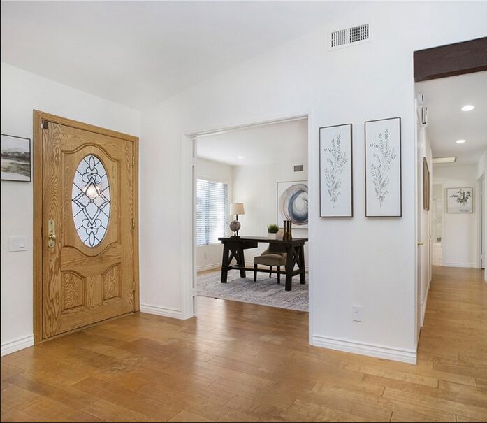 entry and dining room decluttered after picture